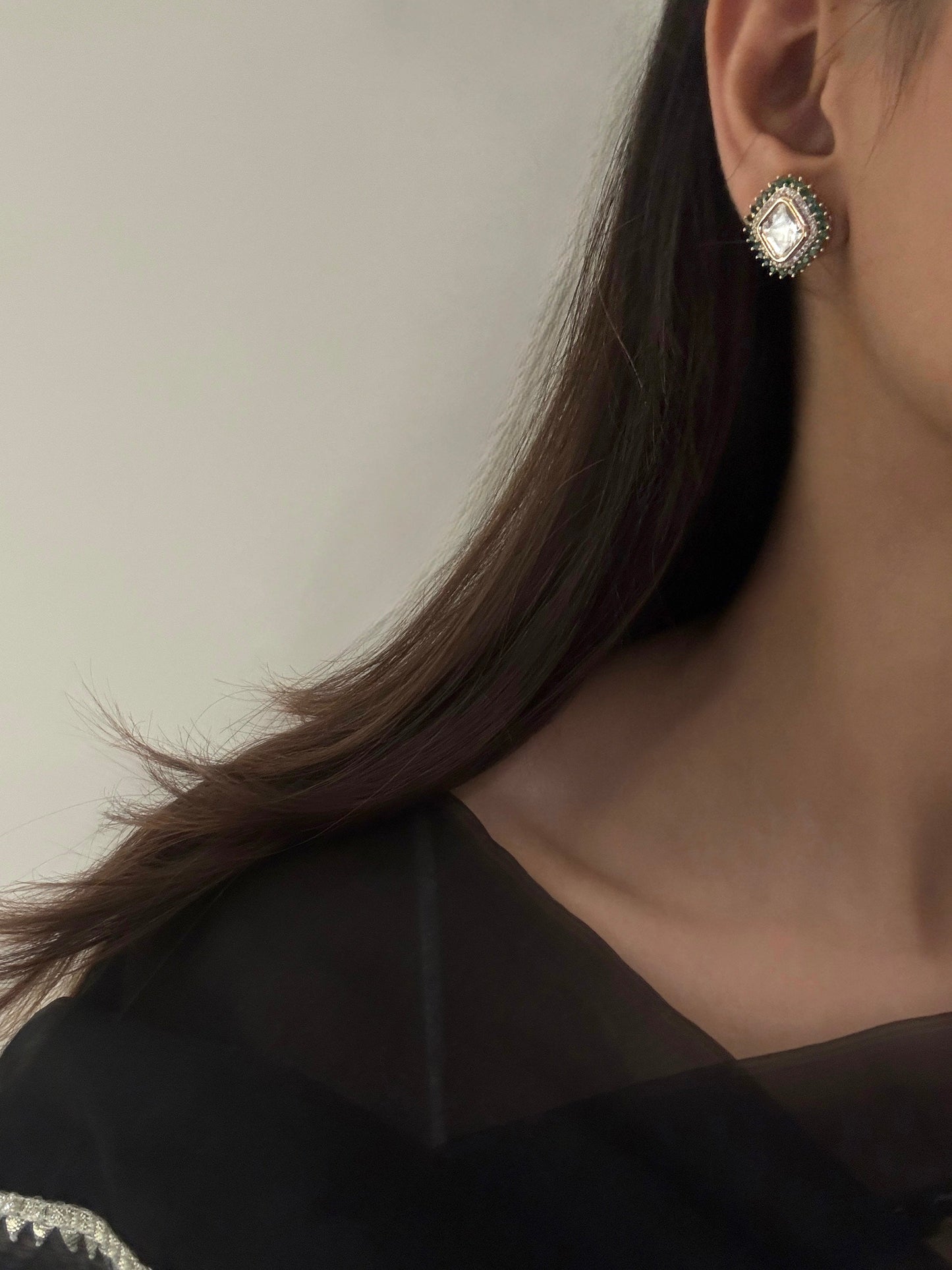 Aishani Emerald Kundan Studs